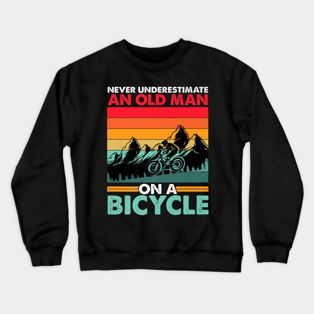 Never Underestimate An Old Guy With A Bicycle Crewneck Sweatshirt by rhazi mode plagget